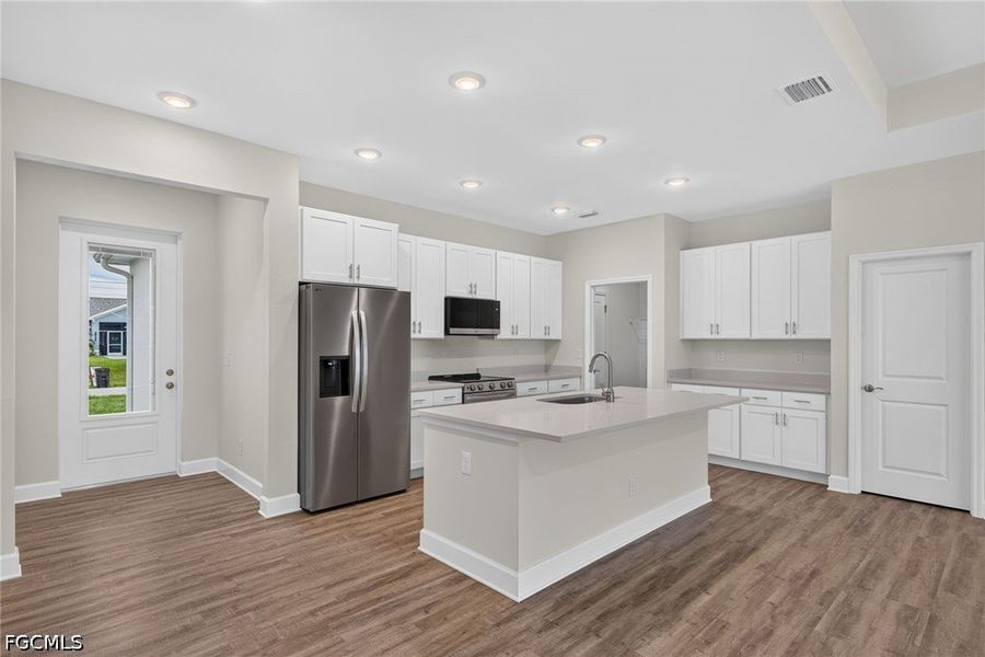 Furnished interior view inside a new home in Cape Coral, Cape Coral (Image 6). Furnished interior view inside a new home in Cape Coral, Cape Coral (Image 6).
