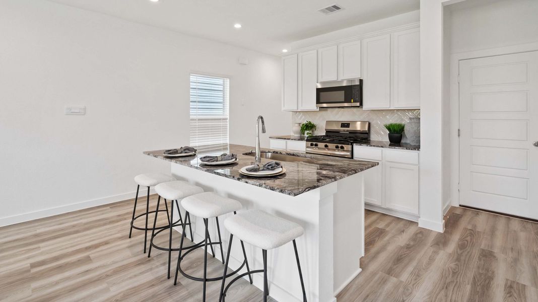 Furnished interior view inside a new home in Grand West, Houston (Image 2). Furnished interior view inside a new home in Grand West, Houston (Image 2).