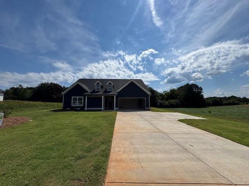 Front exterior of a new home in , Hartwell, GA, highlighting curb appeal (Image 13).