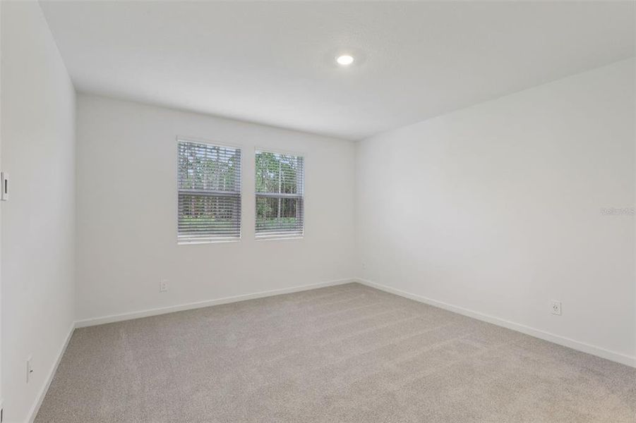 Spacious, unfurnished interior of a new home in Colbert Landings, Palm Coast (Image 19).