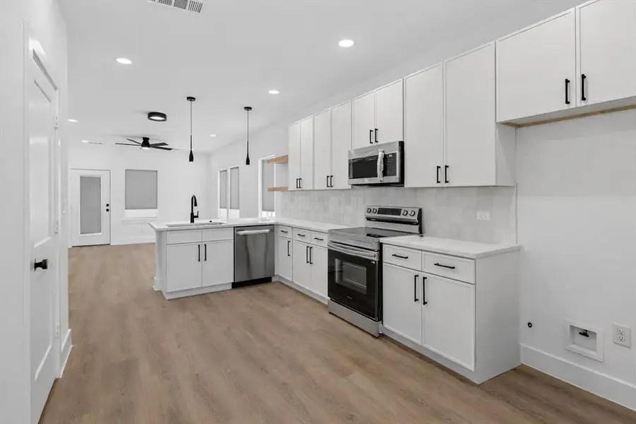 Furnished interior view inside a new home in , Dallas (Image 7).