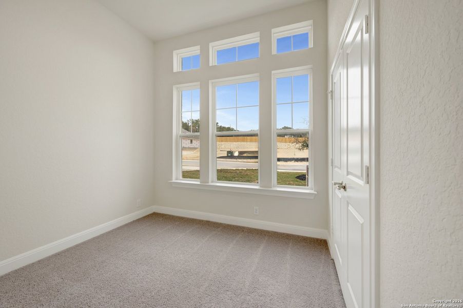Spacious, unfurnished interior of a new home in Windsong - Reserve Series, Boerne (Image 50).