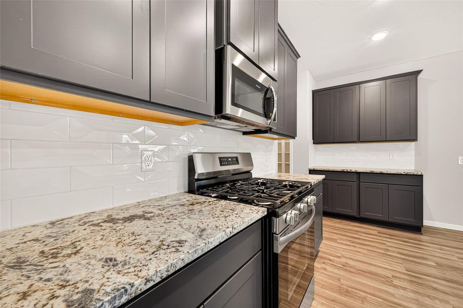 Furnished interior view inside a new home in Mill Creek Trails, Magnolia (Image 10). Furnished interior view inside a new home in Mill Creek Trails, Magnolia (Image 10).