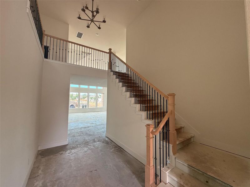 Entryway of home & grand staircase