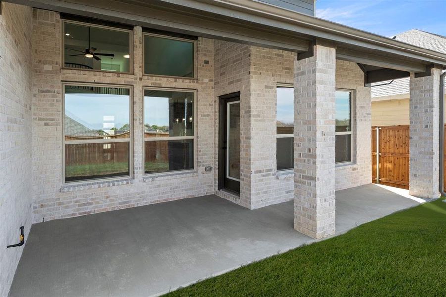 Exterior details and patio area of a home in Inspiration, Lucas (Image 4).