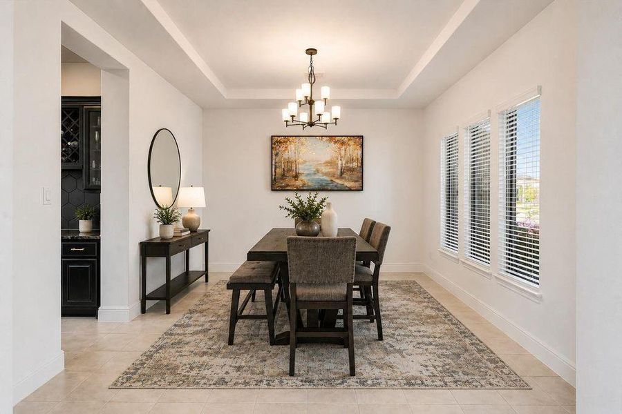 Formal dining area feeds into the bar/butlers pantry and then into the kitchen. -Photo has been virtually altered to help viewer with perspective