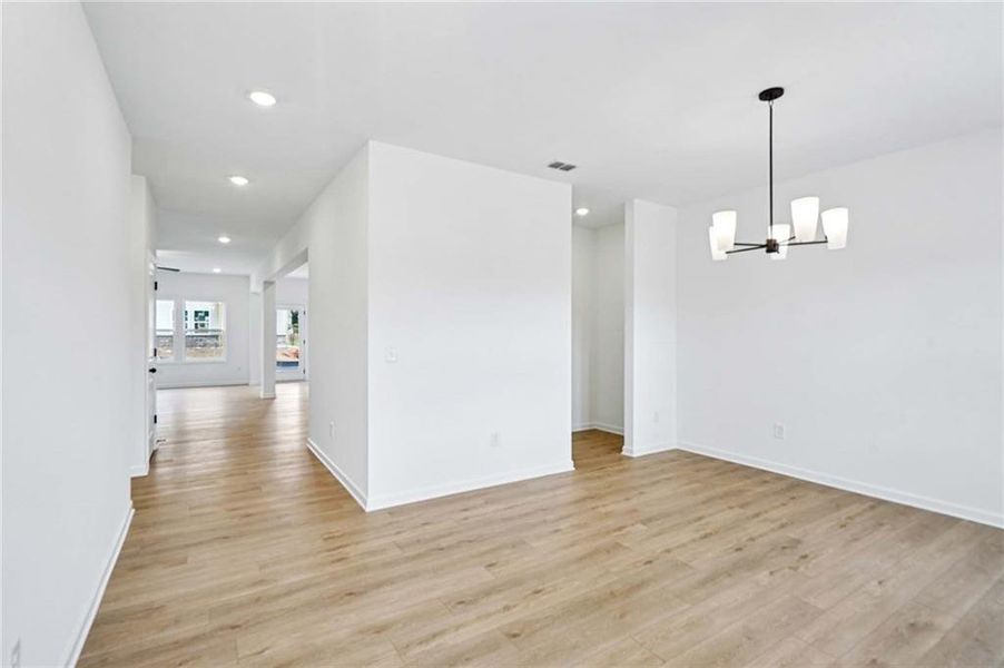 Spacious, unfurnished interior of a new home in Eastlyn Crossing, Flowery Branch (Image 16).