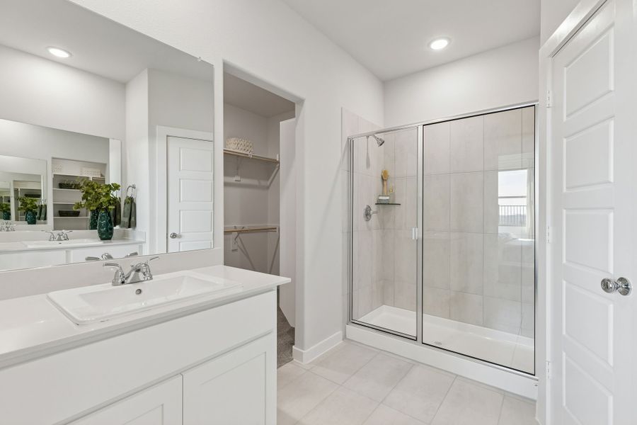 Primary Bathroom in a Nicholson Ranch Magnolia Model Home in Lavon TX by Trophy Signature Homes