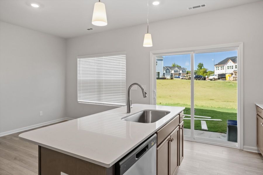 Furnished interior view inside a new home in West Main Townhomes, Sanford (Image 9).