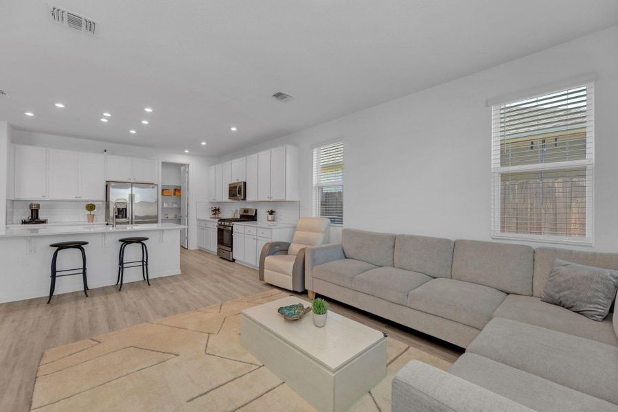 Furnished interior view inside a new home in Seasons at Carillon, Manor (Image 10).