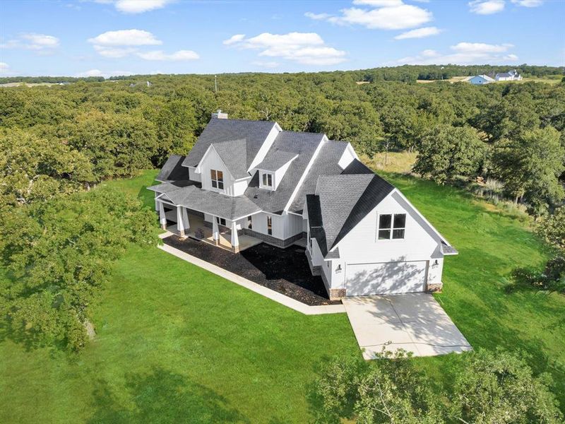 Front exterior of a new home in , Sunset, TX, highlighting curb appeal (Image 20). Front exterior of a new home in , Sunset, TX, highlighting curb appeal (Image 20).