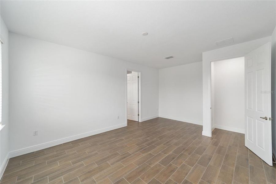 Spacious, unfurnished interior of a new home in On Top of the World Communities, Ocala (Image 41).