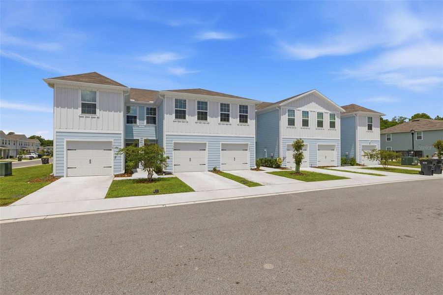 Front exterior of a new home in , New Port Richey, FL, highlighting curb appeal (Image 2). Front exterior of a new home in , New Port Richey, FL, highlighting curb appeal (Image 2).