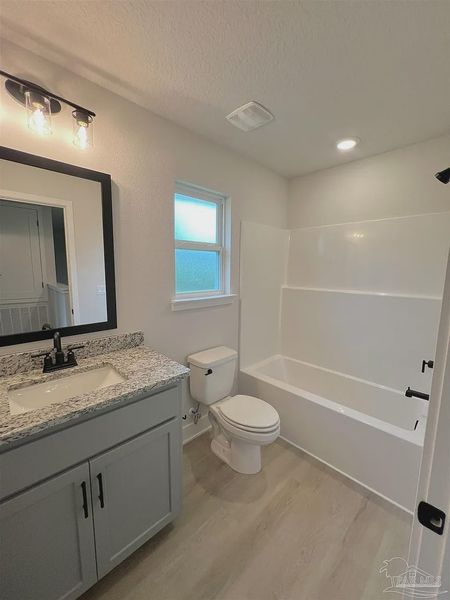 Furnished interior view inside a new home in Pine Top, Cantonment (Image 8).