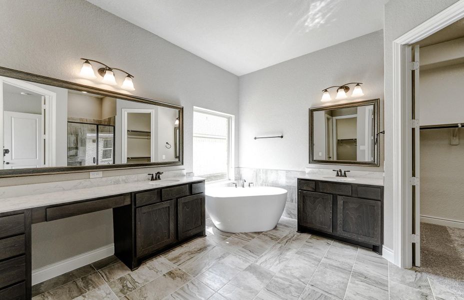 Furnished interior view inside a new home in Bridgeland 60′, Cypress (Image 29).