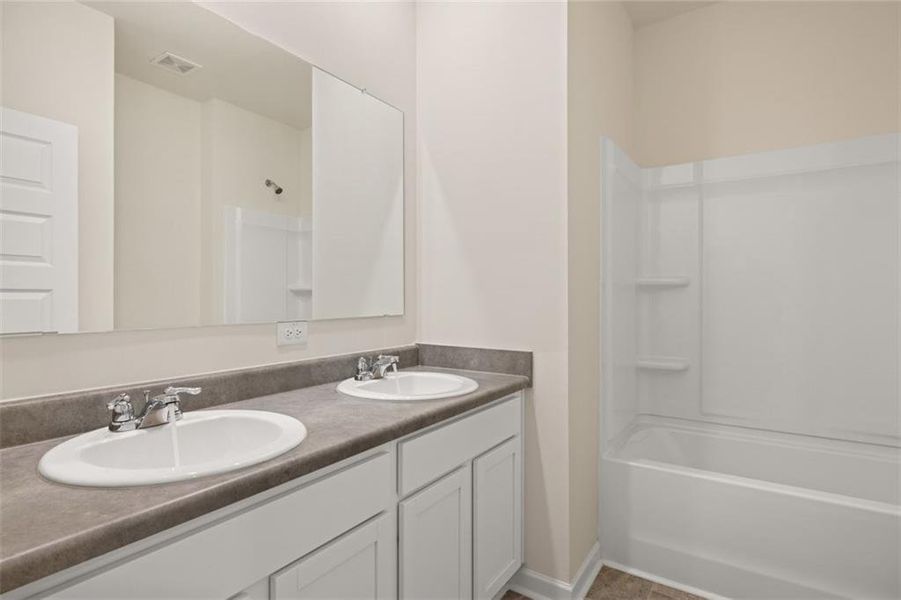 Furnished interior view inside a new home in Preserve at Dove Creek, Statham (Image 17).