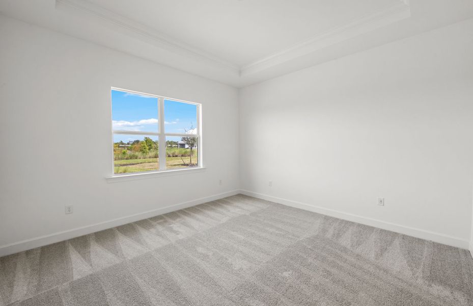 Spacious, unfurnished interior of a new home in Del Webb Oak Creek, North Fort Myers (Image 13).