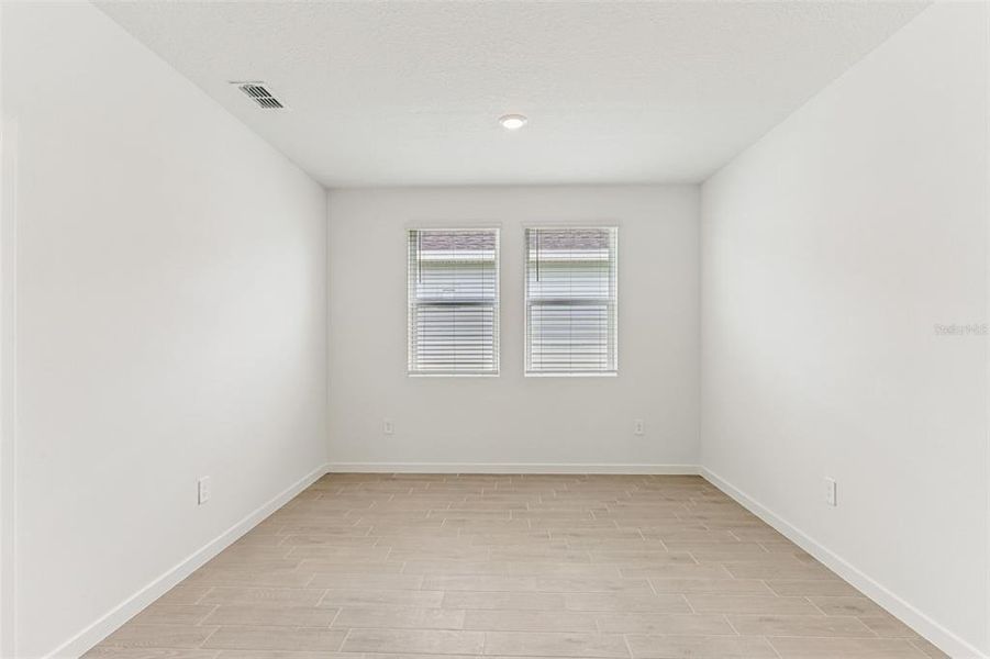 Spacious, unfurnished interior of a new home in Colbert Landings, Palm Coast (Image 24).