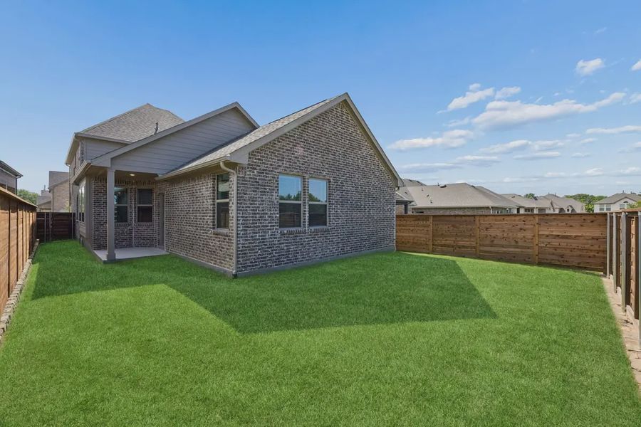 Exterior details and patio area of a home in Solterra Texas, Mesquite (Image 3).