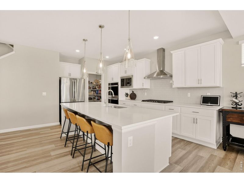 Furnished interior view inside a new home in Mountain Brook, Longmont (Image 30).