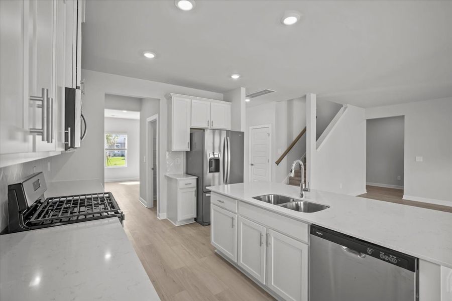 Furnished interior view inside a new home in The Farm at Wells Creek - Signature Collection, Gray Court (Image 9).