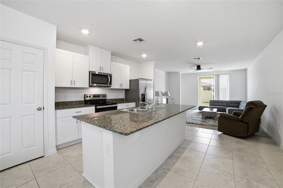 Furnished interior view inside a new home in Springs at Lake Alfred - Classic Series, Lake Alfred (Image 13).