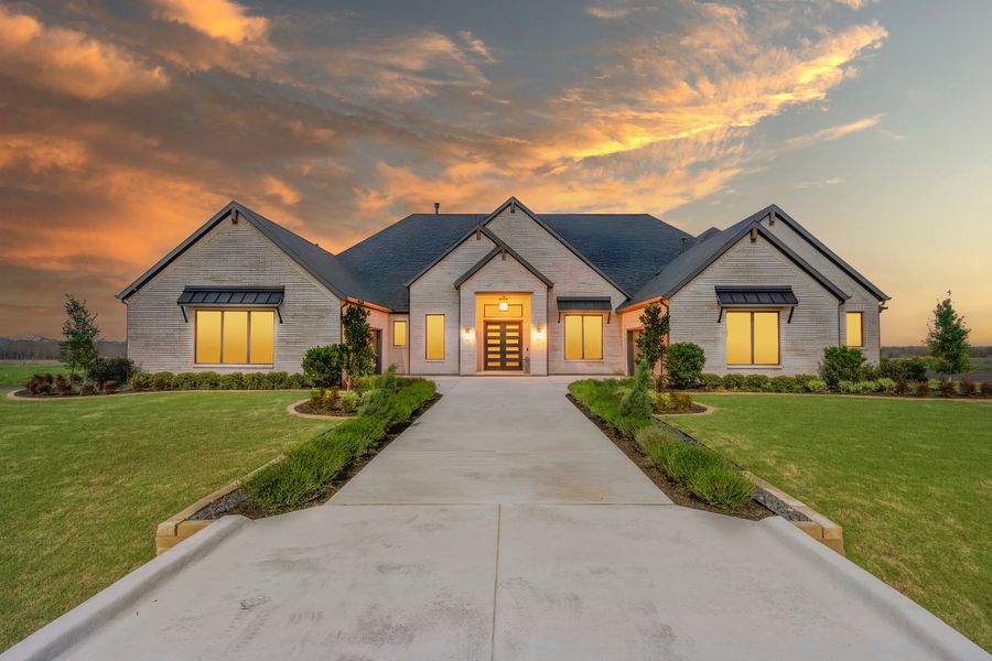 Front exterior of a new home in Ridge Pointe Estates, McLendon-Chisholm, TX, highlighting curb appeal (Image 1). Front exterior of a new home in Ridge Pointe Estates, McLendon-Chisholm, TX, highlighting curb appeal (Image 1).