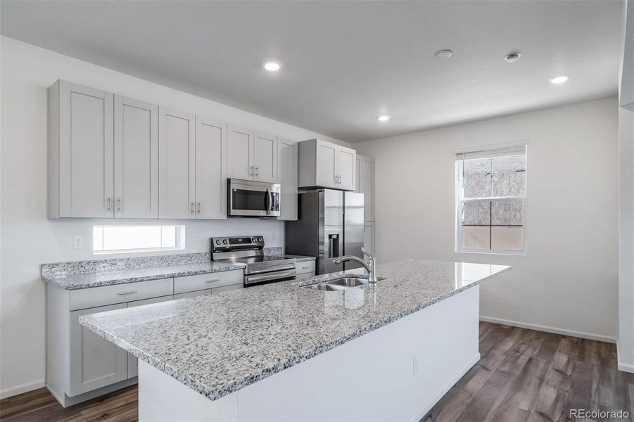Furnished interior view inside a new home in Reunion, Commerce City (Image 7).