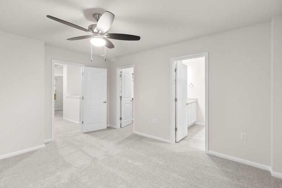 This room features light-colored walls and soft grey carpeting