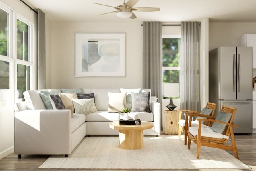 A living room with a couch and a table.