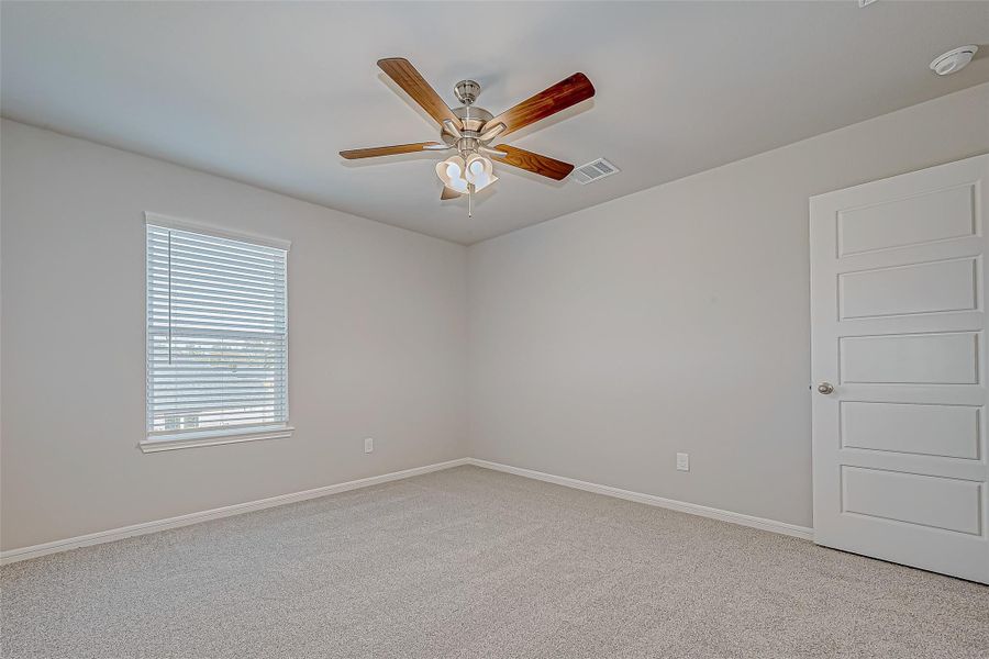 Spacious, unfurnished interior of a new home in Mill Creek Trails, Magnolia (Image 24).