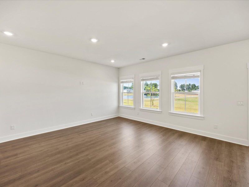 Spacious, unfurnished interior of a new home in The Coves at Lakes of Cane Bay, Summerville (Image 16). Spacious, unfurnished interior of a new home in The Coves at Lakes of Cane Bay, Summerville (Image 16).