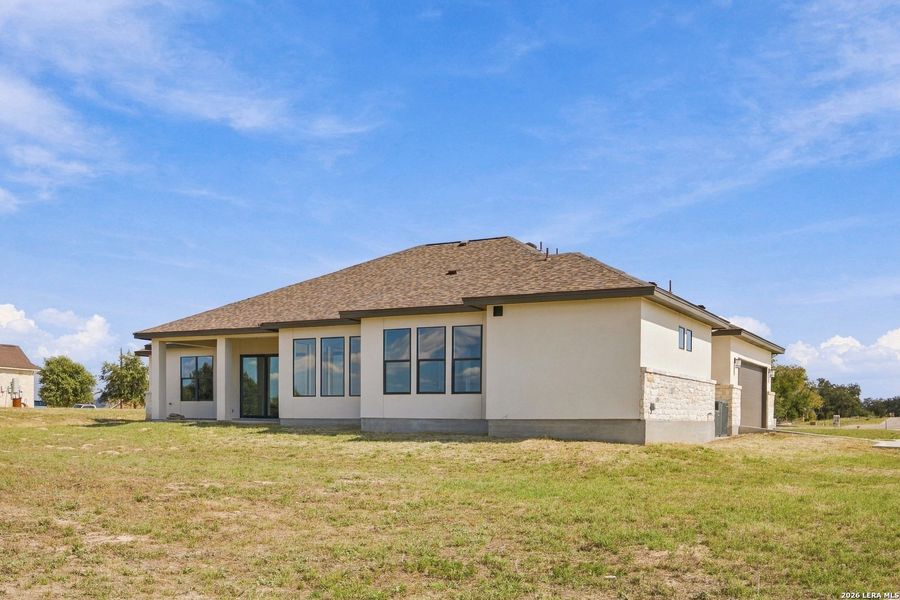 Exterior details and patio area of a home in , Floresville (Image 29).