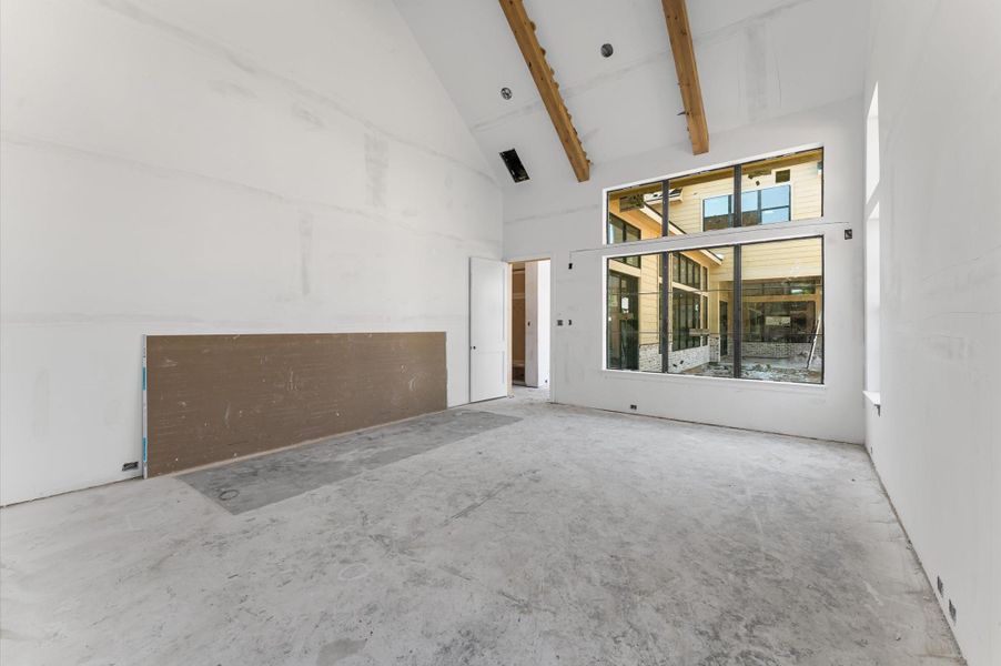 First Floor Primary Bedroom with 20 ft cathedral Ceilings