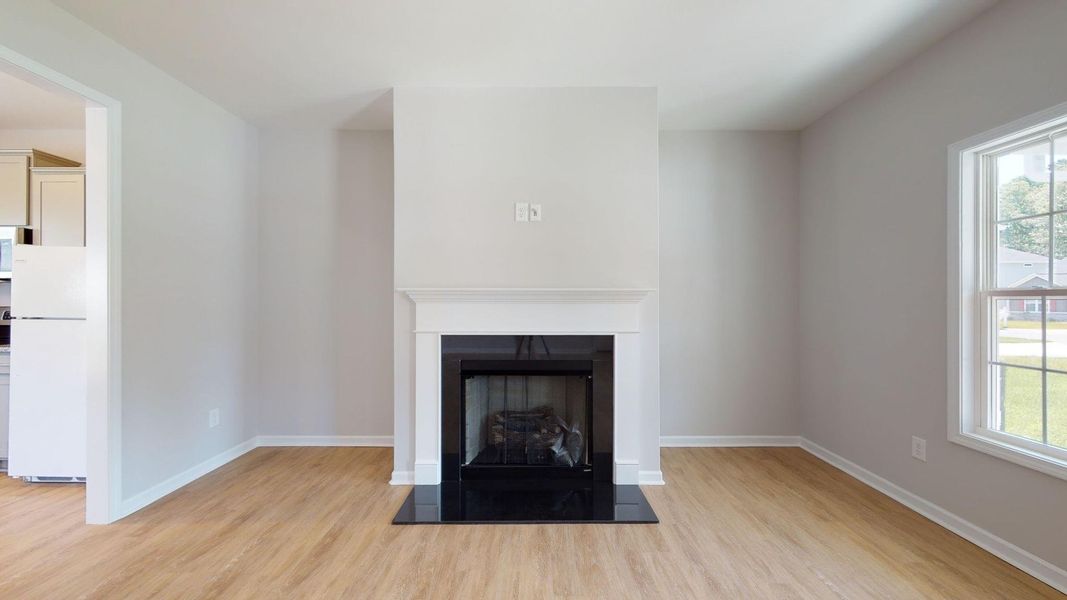 Representative unfurnished interior of a home built from the Tyler A by JC Jackson Homes,LLC in Heritage Pointe, Newport (Image 14).