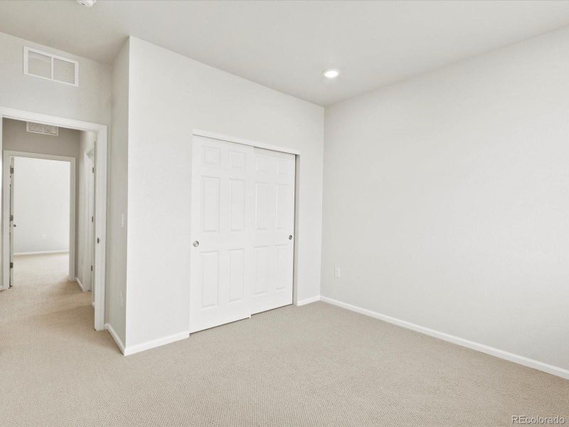 Spacious, unfurnished interior of a new home in Poudre Heights: The Alpine Collection, Windsor (Image 37).