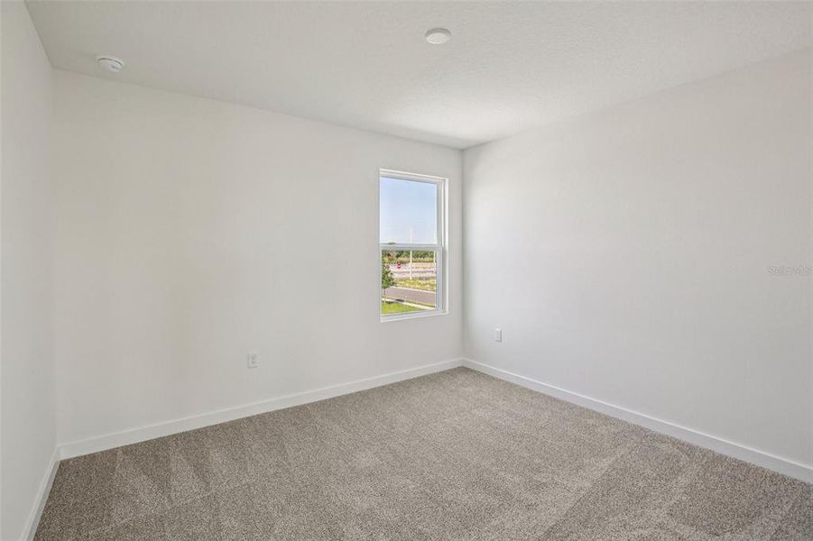 Spacious, unfurnished interior of a new home in Willowbrook North, Winter Haven (Image 26).