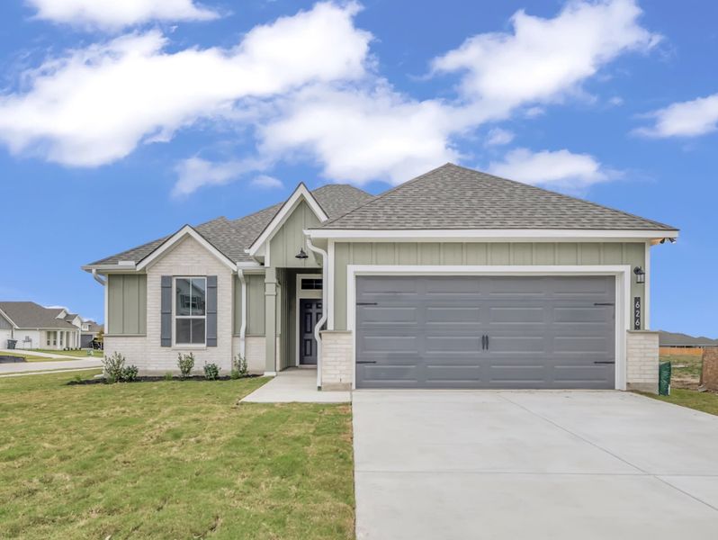 Front exterior of a new home in Eagles Landing, Waco, TX, highlighting curb appeal (Image 1). Front exterior of a new home in Eagles Landing, Waco, TX, highlighting curb appeal (Image 1).