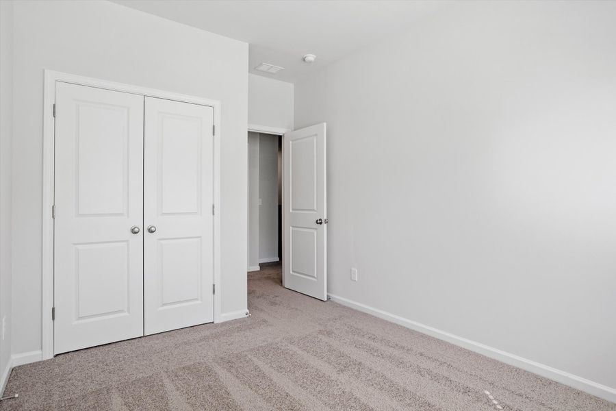 Spacious, unfurnished interior of a new home in West Main Townhomes, Sanford (Image 26).