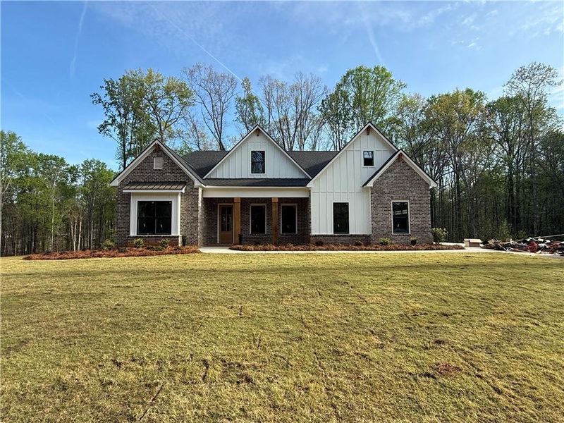 Front exterior of a new home in , Pendergrass, GA, highlighting curb appeal (Image 13).