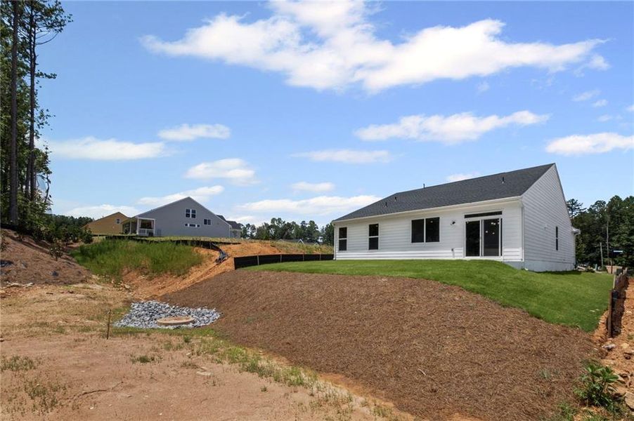 Front exterior of a new home in Easton Park, Dallas, GA, highlighting curb appeal (Image 18).