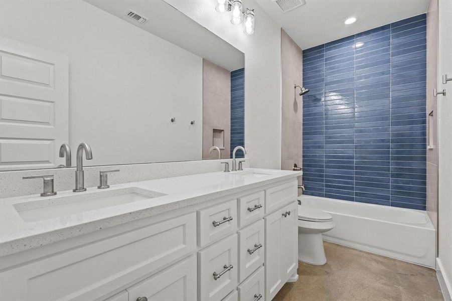 Full bath with double vanity and washtub / shower combination