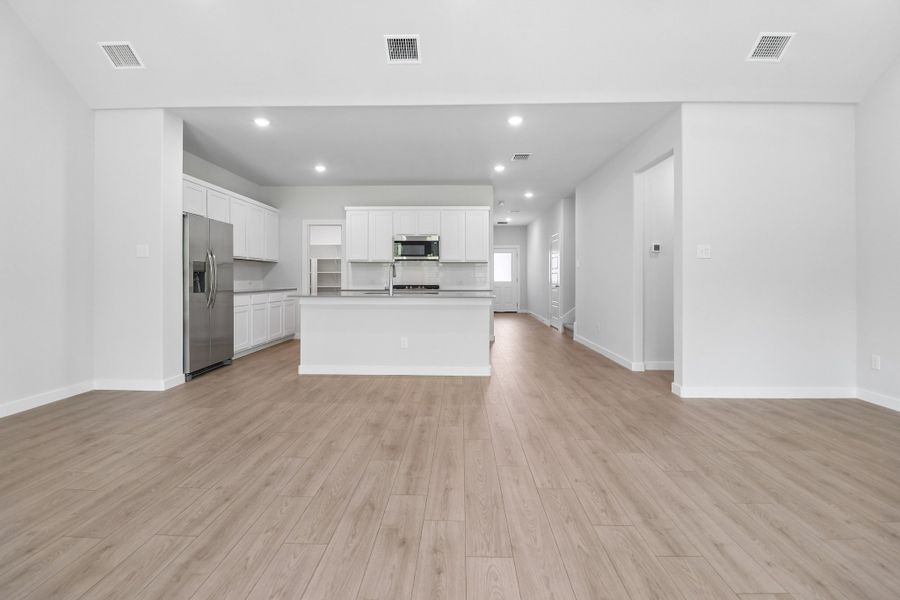 Open Concept in the Masters home plan by Trophy Signature Homes