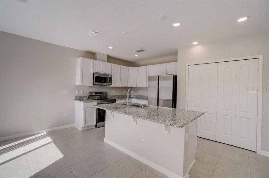 Furnished interior view inside a new home in Royal Highlands, Weeki Wachee (Image 7).