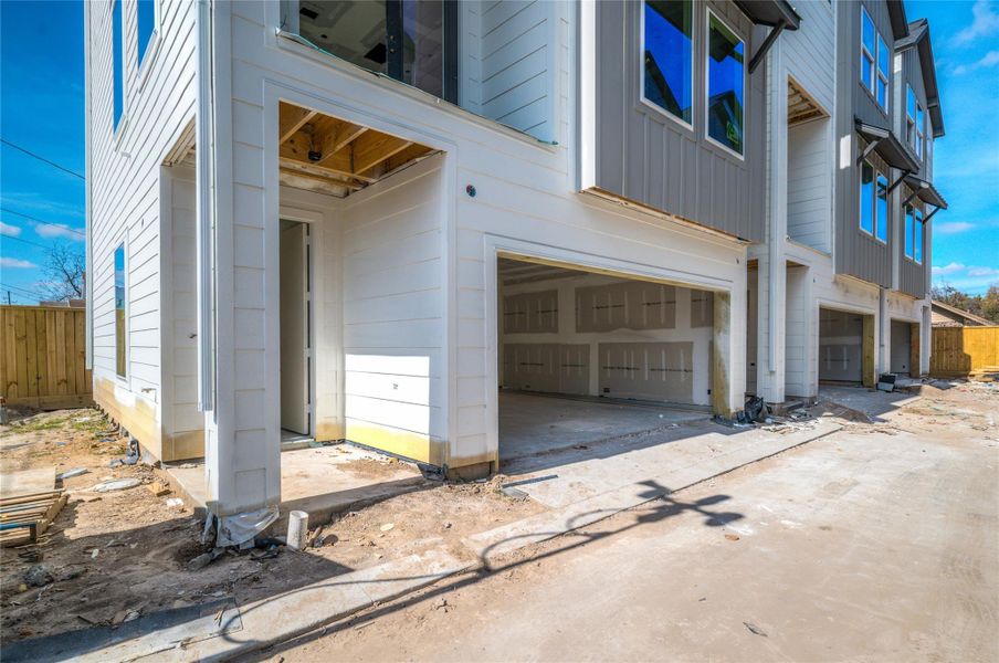 As you walk up, notice the 2 car garage and inviting front porch.