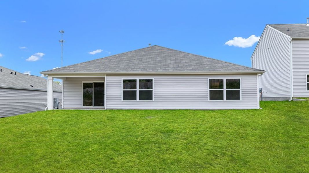 Exterior details and patio area of a home in Lakestone, Woodruff (Image 20).