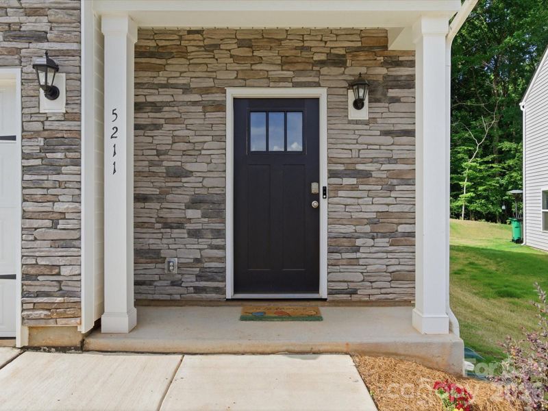 Exterior details and patio area of a home in Reedy Creek Preserve, Charlotte (Image 3).