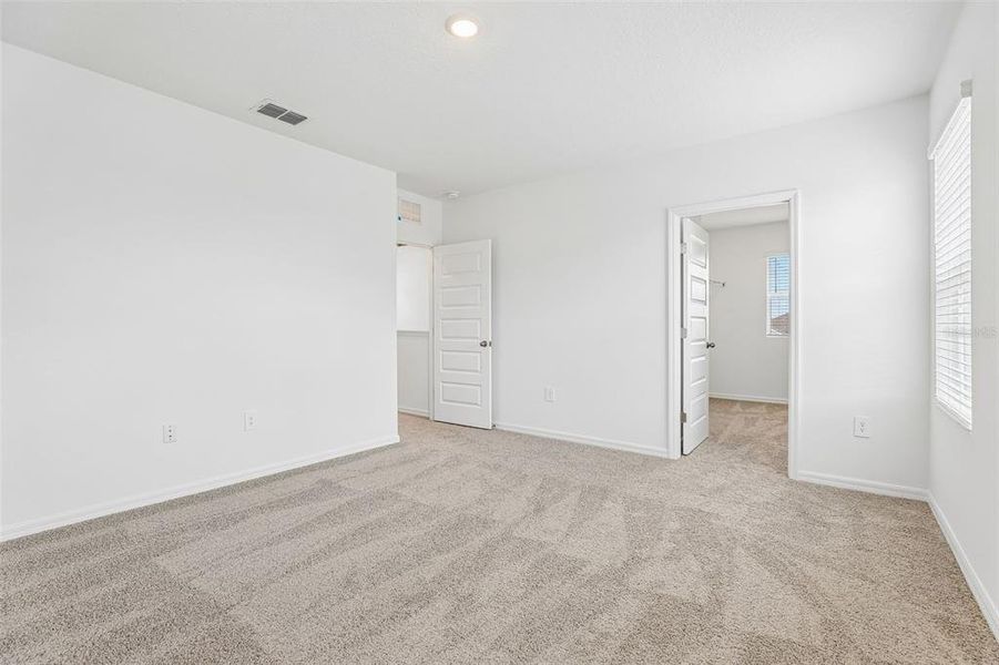 Spacious, unfurnished interior of a new home in Avalon Park Tavares, Tavares (Image 32).