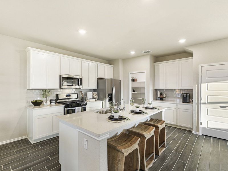 Santiago model kitchen island at Hidden Springs in New Braunfels, TX by Century Communities