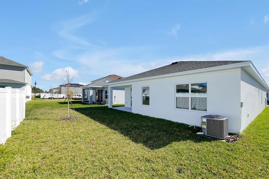 Exterior details and patio area of a home in Prairie Oaks, St. Cloud (Image 4).